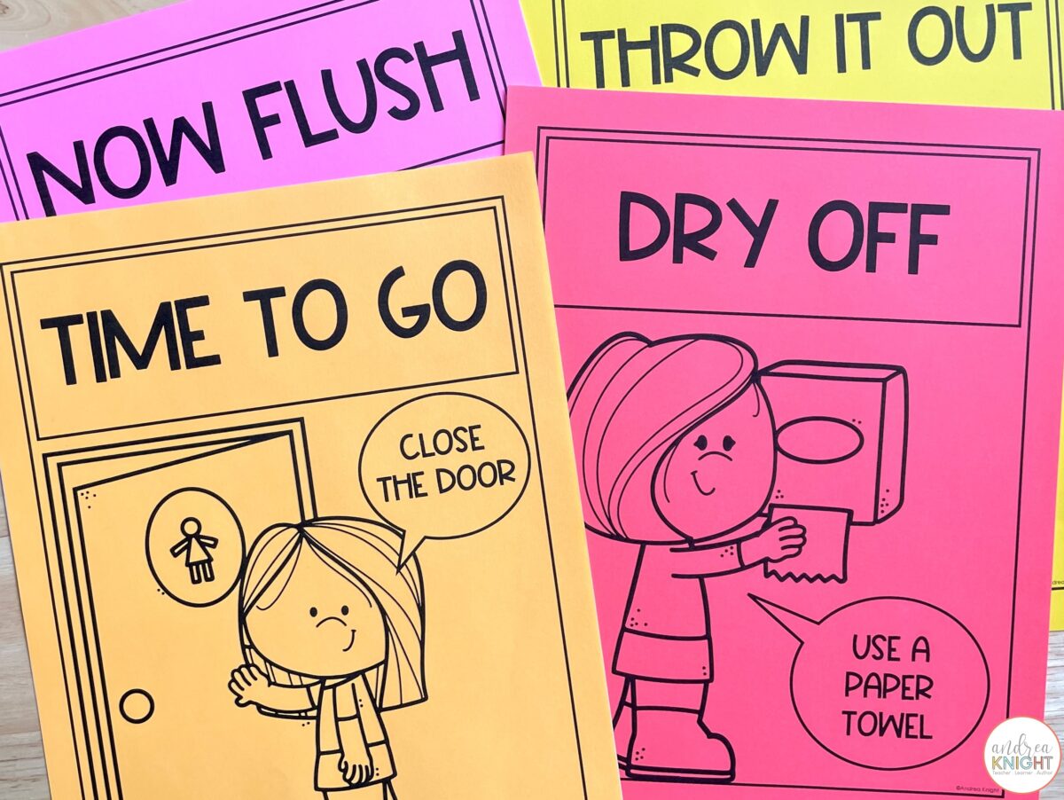 This photo shows the bathroom signs printed in black and white on brightly colored card stock as a way to save on color ink.